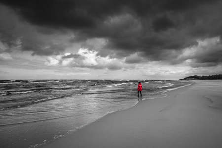 Women Walking along the beach.の写真素材