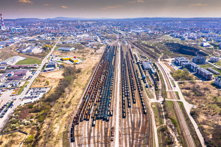 Cargo trains. Aerial view of colorful freight trains on the railway station. Wagons with goods on railroad.Aerial viewの写真素材