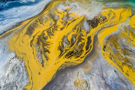 Degraded landscape. Destroyed land. View from above. Surrealistic lake.Human impact on the...