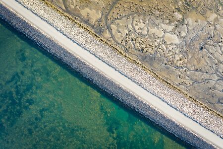 Aerial view on road in Iceland. Aerial landscape above highway. Icelandic landscape from air.の写真素材