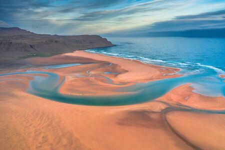 Aerial view of Raudasandur beach at the west fjords of Icelandの写真素材