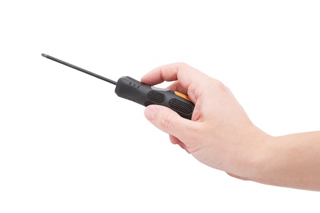 Man's hand repairing something with screwdriver. Isolated on white backgroundの写真素材