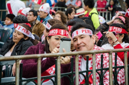 Lima, Peru - OCTOBER 10th 2017: Fanaticism in Peru (Peru vs. Colombia) Russia 2018. A couple taking a pictureのeditorial素材