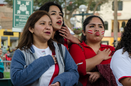 Lima, Peru - OCTOBER 10th 2017: Fanaticism in Peru (Peru vs. Colombia) Russia 2018. Patriots intoning the National Anthem hours before the match between Peru and Colombiaのeditorial素材