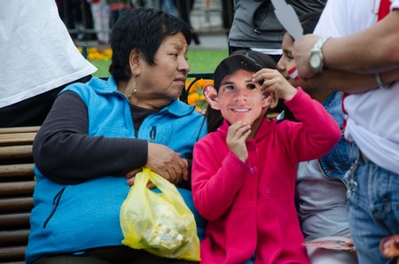 Lima, Peru - OCTOBER 10th 2017: Fanaticism in Peru (Peru vs. Colombia) Russia 2018. Child with face mask of player Edison Flores (Peruvian Selection)のeditorial素材
