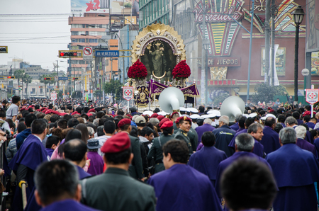 Lima, Peru - OCTOBER 28th 2017: Procession of the Lord of Miracles. As every year, the devotees accompany the dark-haired Christ through the streets of downtown Limaのeditorial素材
