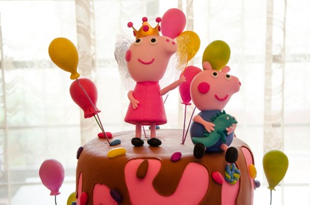 Children's Party Decoration, cake with thematic of Peppa pigの写真素材