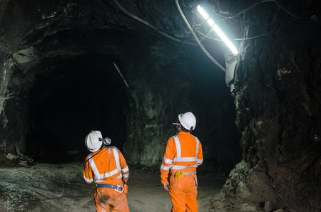 Two miners observing the cavernの写真素材