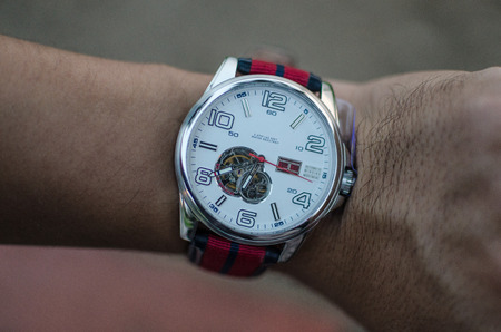 A hand and a watch