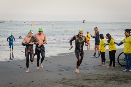 LIMA, PERU - APRIL 22th 2018: Ironman 70.3. Starting for the swimming test of the athletes of the Ironman 70.3のeditorial素材