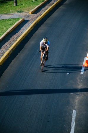LIMA, PERU - APRIL 22th 2018: Ironman 70.3. Athletes competing in the second stage of this great competition that is now cyclingのeditorial素材