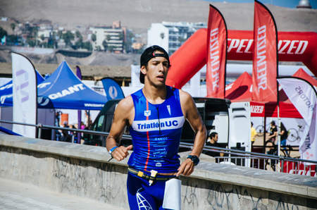 LIMA, PERU - APRIL 22th 2018: Ironman 70.3. And finally athletes entering the last level of this great competition that is the running raceのeditorial素材