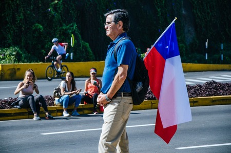 LIMA, PERU - APRIL 22th 2018: Ironman 70.3. Public spectator supporting his country or relatives in the raceのeditorial素材