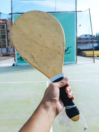 Wooden racquet for Fronton game, one-handed racquet with bottom of the wall to play frontonの写真素材