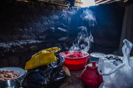 Cheap clay and wooden dish on the table in a village house in Canta - Peruの写真素材