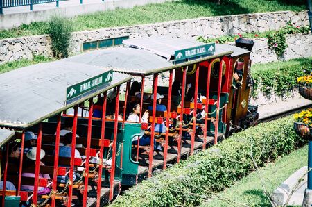 Lima, Peru - November 2, 2018: Families enjoy a ride on train at park of friendship on a summer afternoon in Lima - Peruのeditorial素材