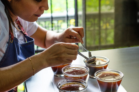 Professional coffee taster testing new smells and flavors.