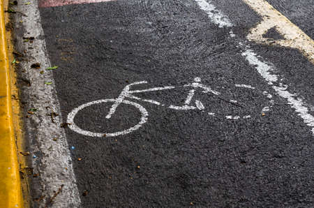 Bicycle old road sign in the city.の写真素材