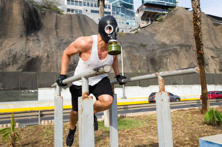 athletic man in a protective mask at practice in the morning.