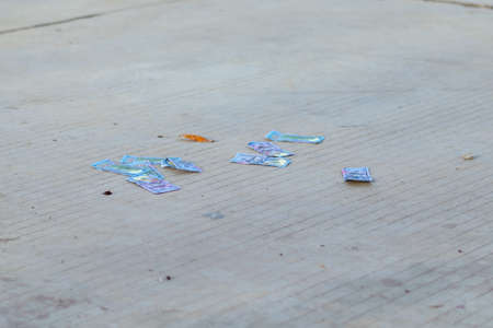 Dollar bills on the ground. Lost money concept.の写真素材