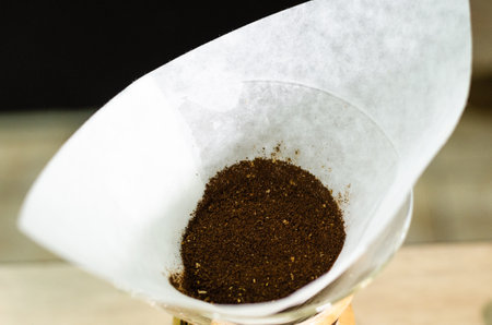 Preparing coffee with glass chemex in the coffee shop. The Chemex coffee machine is a device to...