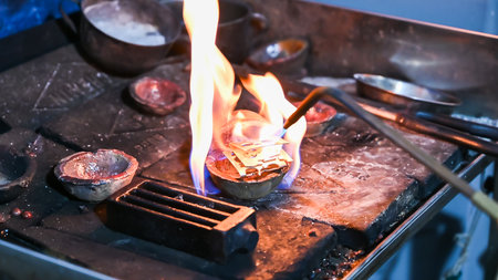 Traditional peruvian metalworking with fiery forge
