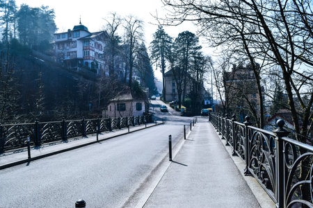 Misty european town street with vintage architecture