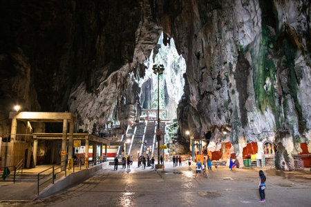 Tourists visiting batu caves landmark in kuala lumpurの写真素材