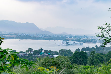 Udaipur city palace overlooking lake pichola in rajasthan indiaの写真素材