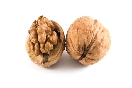 two walnuts isolated on a white background