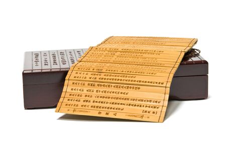 closed ancient Chinese chest and bamboo slips isolated on white backgroundの写真素材