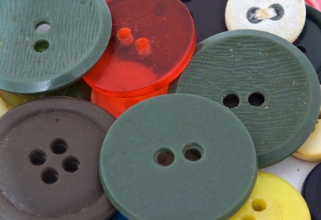 An assortment of coloured buttonsの写真素材