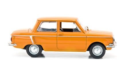 model of orange car is isolated on a white background