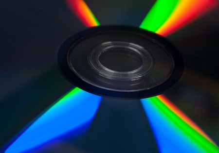 blank CD or DVD disc on black backgroundの写真素材