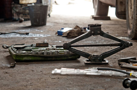 auto parts that include a car jack, lug wrench