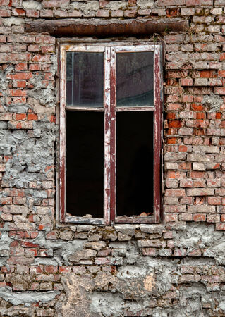 old dirty window on old dirty wall 