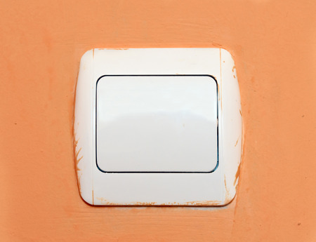 Light switch on a wallの写真素材