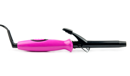pink electric curling iron isolated on white backgroundの写真素材