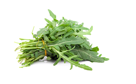 green rocket or roquette leaves isolated on whiteの写真素材