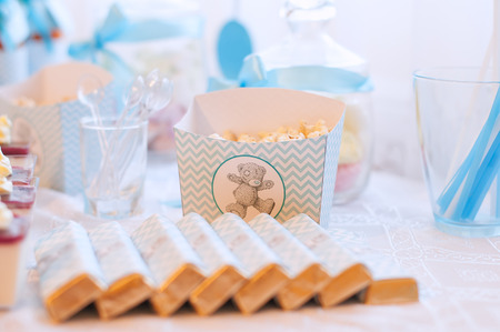 dessert table for a party. Cupcakes, sweetness and flowersの写真素材