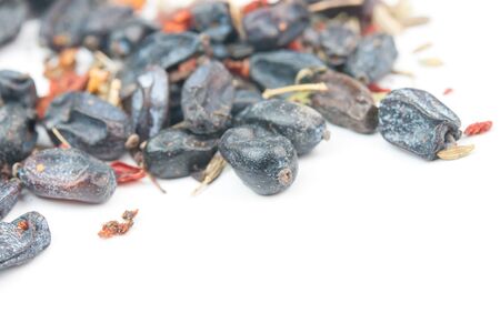 black dry barberry spice. Isolated on white backgroundの写真素材