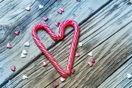 Valentines Day background with a sweet caramel heartの写真素材