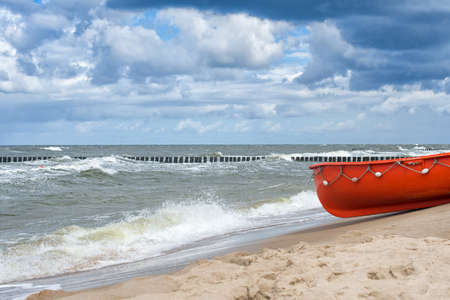 wooden fishing boat on the beach in Poland. Baltic Seaの写真素材