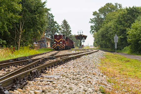 Niechorze, Poland, June 2020 Old diesel narrow gauge train departing from train station. Popular...