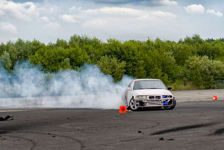 Car drifting, Sport car wheel drifting and smoking on track