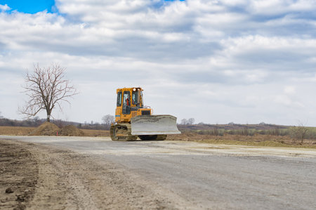 The earth is bulldozed in road construction in Ukraine.