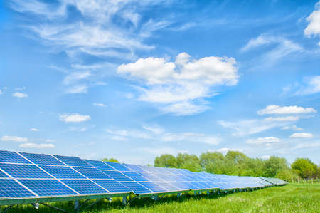 Solar panels and blue sky. Solar panels system power generators from sun. Clean technology for better futureの写真素材