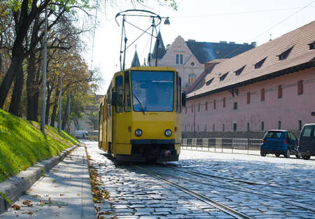 Old tram travel along the street of the old city of Europe. Lviv, Ukraineの写真素材