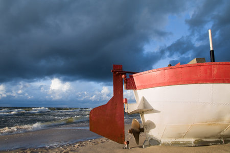 Fishing boat on the beach of the Polish Baltic coast near Rewal