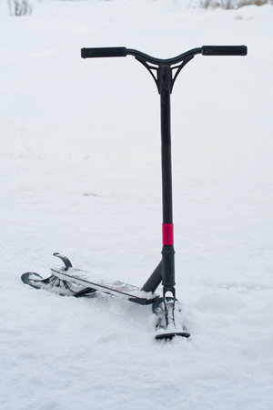 snow scooter in snow. A close upの写真素材